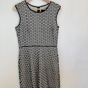 Sleeveless dress with embroidered over sheath